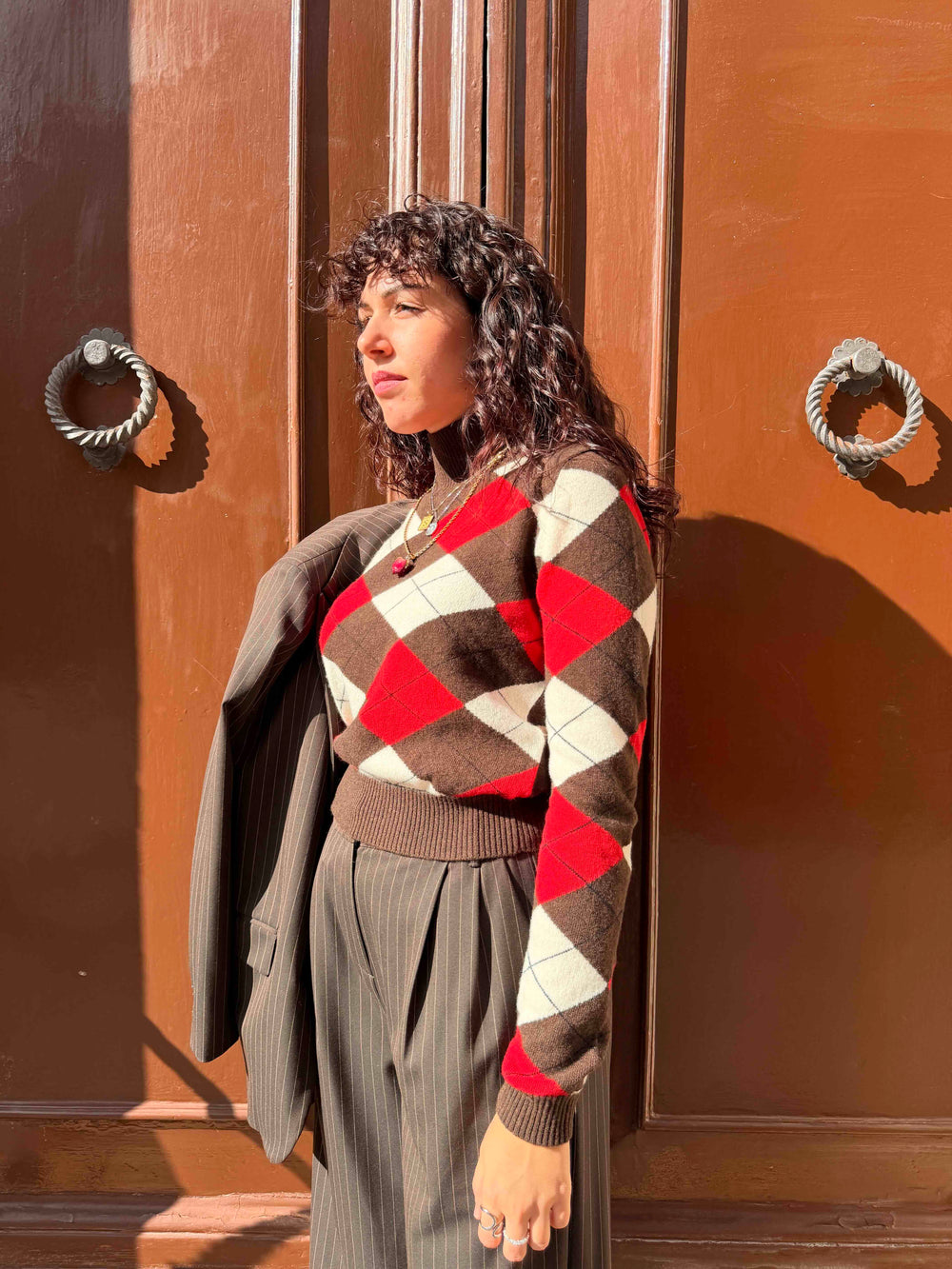 Maglione a rombi rosso e cioccolato in lana e cashmere 