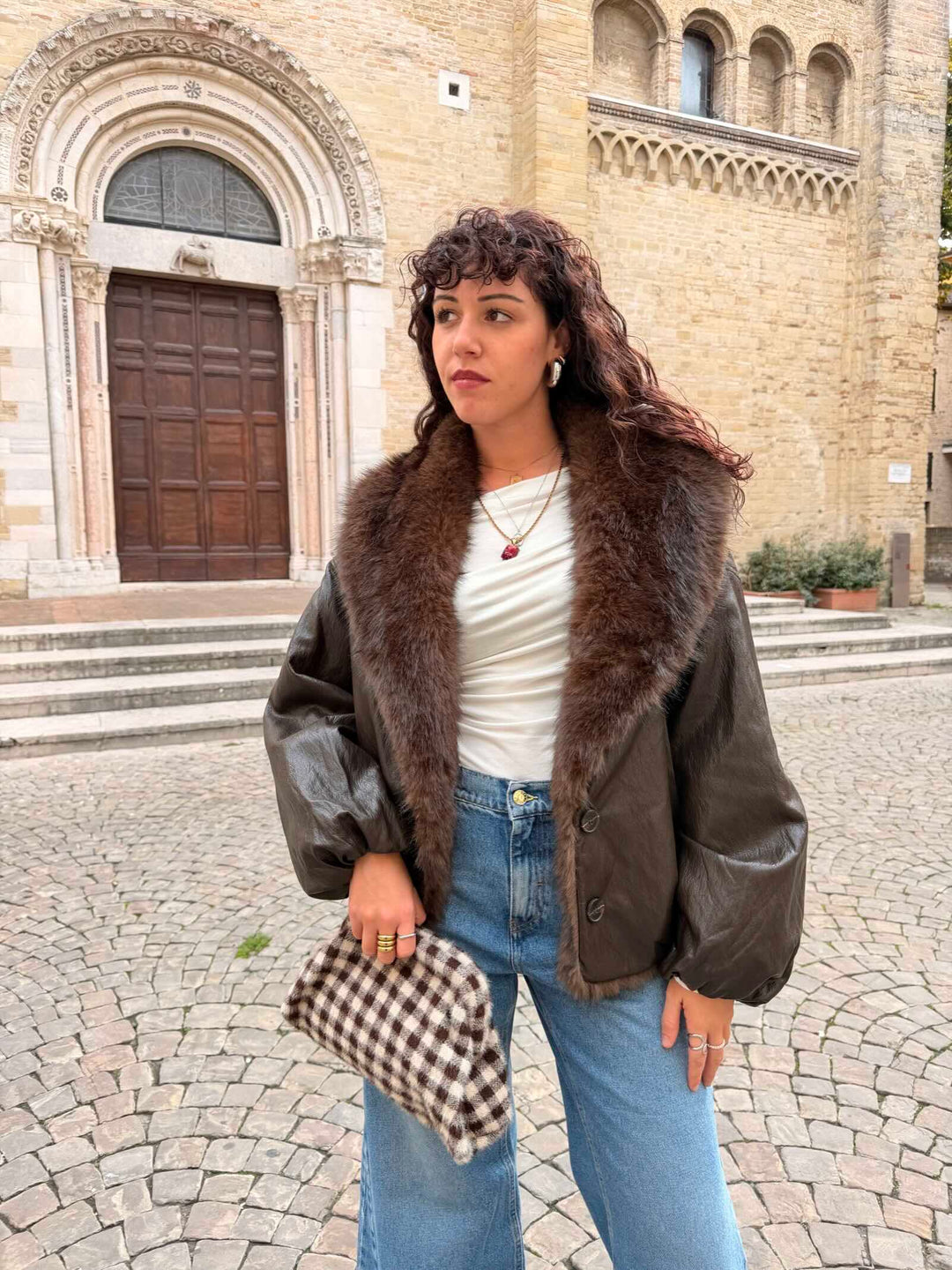 Giubbotto moro  in ecopelle con collo in ecopelliccia 