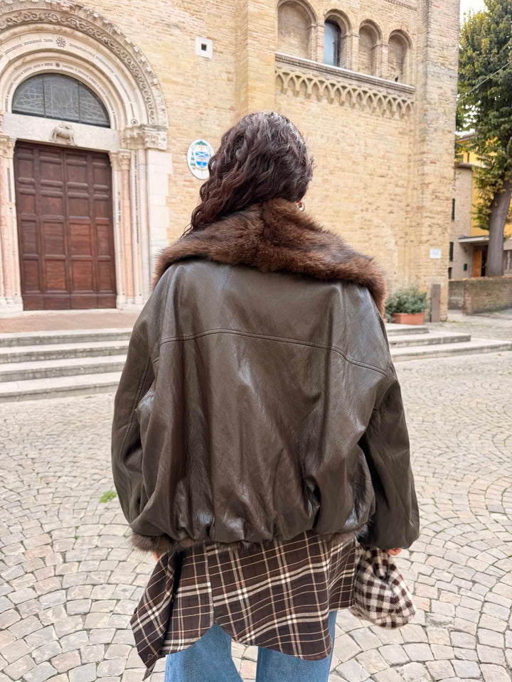 Giubbotto moro  in ecopelle con collo in ecopelliccia 