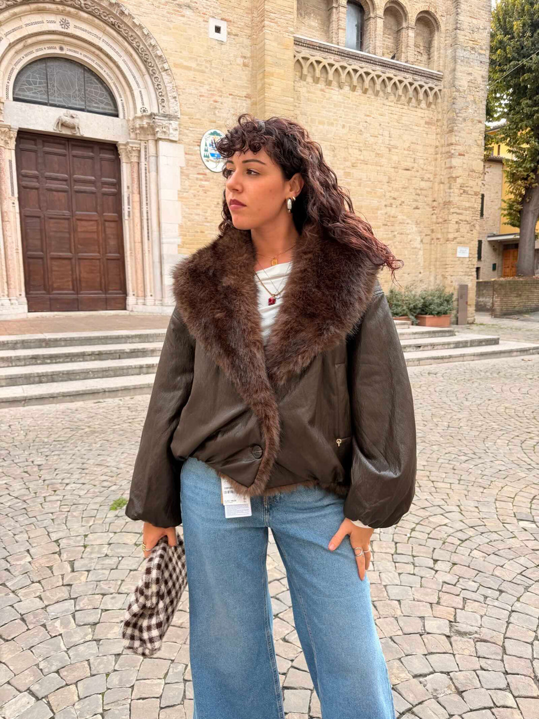 Giubbotto moro  in ecopelle con collo in ecopelliccia 