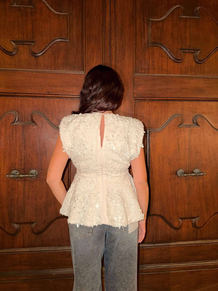 Top panna con paillettes svasato 