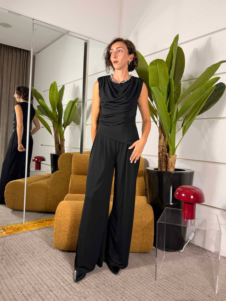 Tuta arricciata con pantalone a palazzo nera 