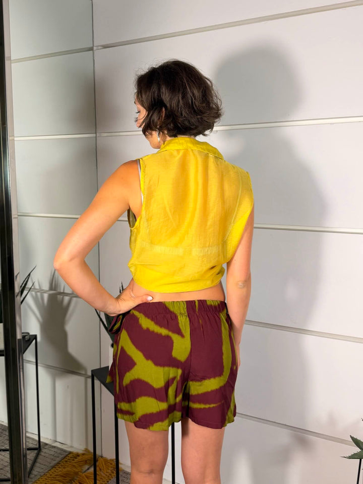 camicia smanicata con nodo in vitain voile olio<BR/><BR/> 