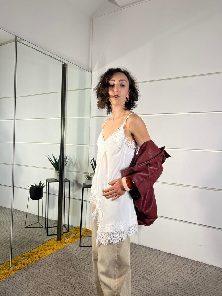 top bianco asimmetrico con pizzo bianco S26T482BIANCO TENSIONE IN